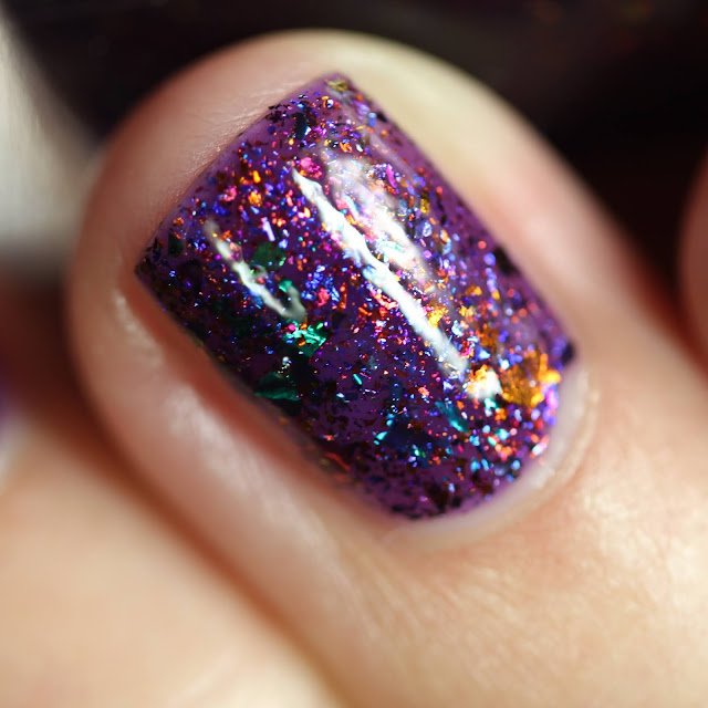 purple nail polish with multi chrome flakes