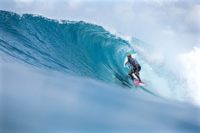 Surfing in maldives