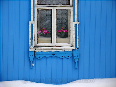 Traditional Russian house in winter