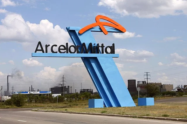 Cover Image Attribute: The file photo of ArcelorMittal Temirtau entrance, located at the eastern industrial zone of Temirtau in Kazakhstan / Date: 10 August 2013 / Source: Wikimedia Commons.