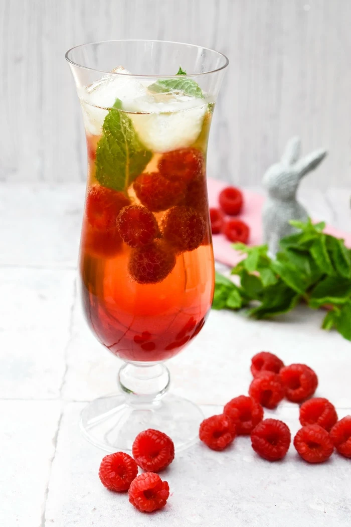 A tall glass of Scottish Raspberry & Mint Cider Cooler