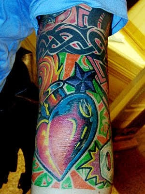 Eagle Side Tattoo · Colorful Back Tattoo · Tribal Flower Armband
