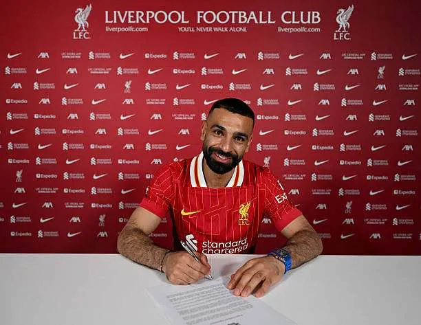 Mohamed Salah of Liverpool signs a contract extension at Anfield on April 11, 2025, in Liverpool, England. Photo by Andrew Powell/Getty Images