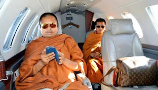 freezing of 16 bank accounts associated with the Thai monk