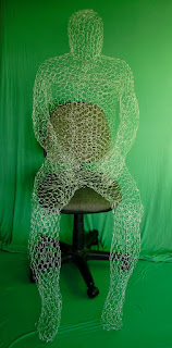 In attempt to explore another dimension of the personal narratives and self expressive elements of my current project (Memories in Exile) I produced this sculpture of myself with chicken wire. Choosing the medium is based on the multiplicity time layer aspect of the project. The open pores like  body, suggests invisibility of time as my imagination is actively trying to embrace events in the past that memories build upon.  This work is still in progress as it might expand towards and independent installation.