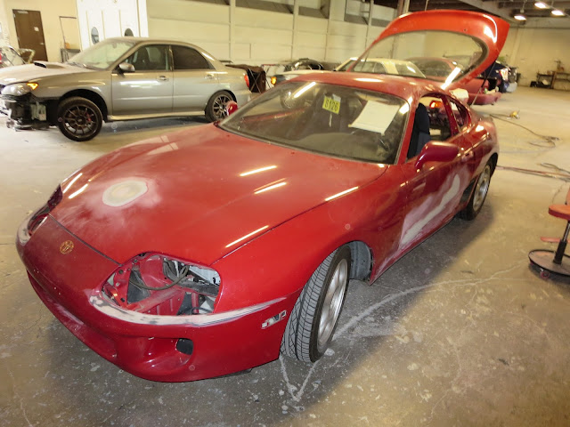 Auto body repairs in process on 1995 Toyota Supra at Almost Everything Auto Body