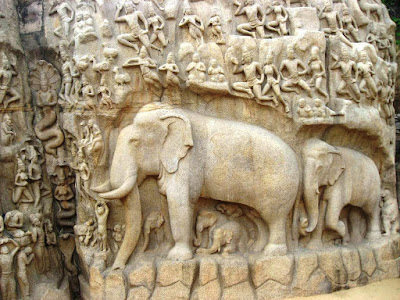 Elephant in the center and the pious on the bottom left round off Arjuna's Penance at Mahabalipuram