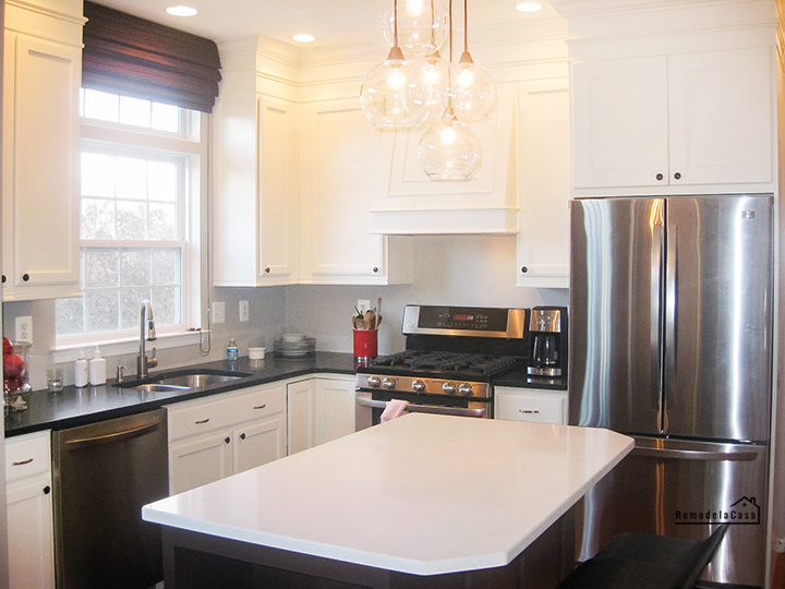 kitchen cabinets painted Benjamin Moore Aura - Satin - Navajo White and Tudor Brown