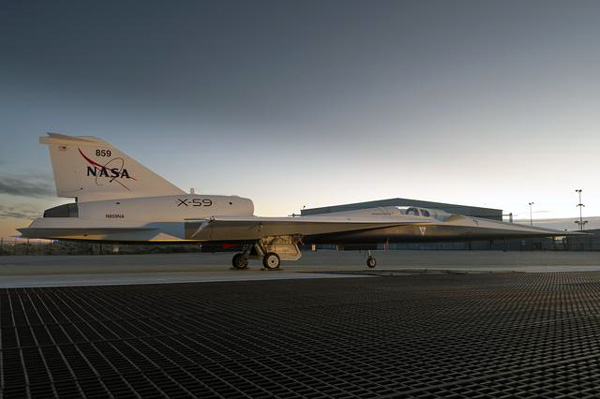 NASA's X-59 QueSST aircraft sits on the ramp at Lockheed Martin Skunk Works in Palmdale, California...during sunrise on December 12, 2023.