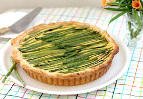 Food Lust People Love: This cheesy asparagus potato tart takes three of my favorite things – crisp puff pastry, cheesy mashed potatoes made with creamy yogurt, and fresh asparagus – and turns them into so much more than the sum of three tasty parts.