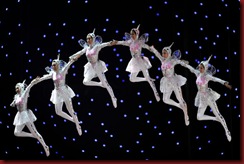 Performers are seen suspended above the stage during the closing ceremony of the the World Expo 2010 in Shanghai on October 31, 2010. Shanghai shuts the gates to the World Expo -- a six-month exhibition of culture and technology that saw record attendance, a parade of foreign leaders and a display of China's growing power.  AFP PHOTO/Philippe Lopez (Photo credit should read PHILIPPE LOPEZ/AFP/Getty Images)