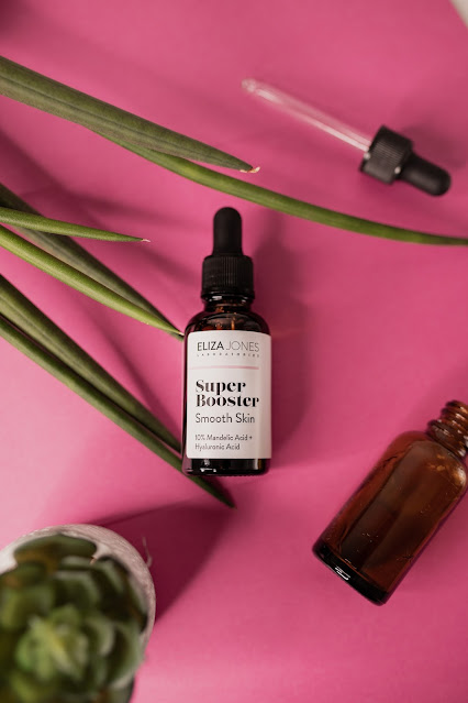 Super Booster face serum photo by Dominika Roseclay