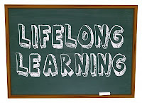 Life long learner written on a chalkboard