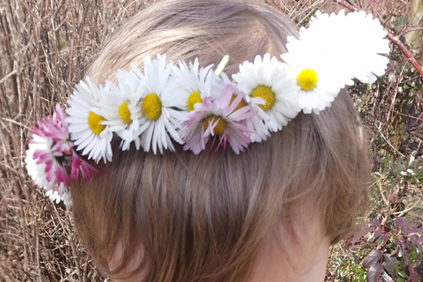 Learn how to make a daisy chain crown and 99 other summer activity ideas for kids