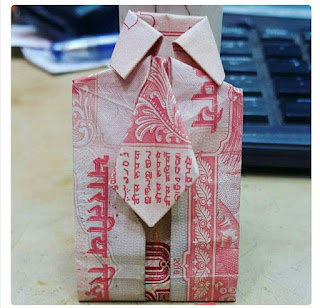 SHIRT WITH RS. 20 NOTE