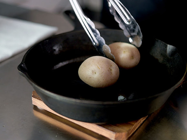 Place potato on the pan.