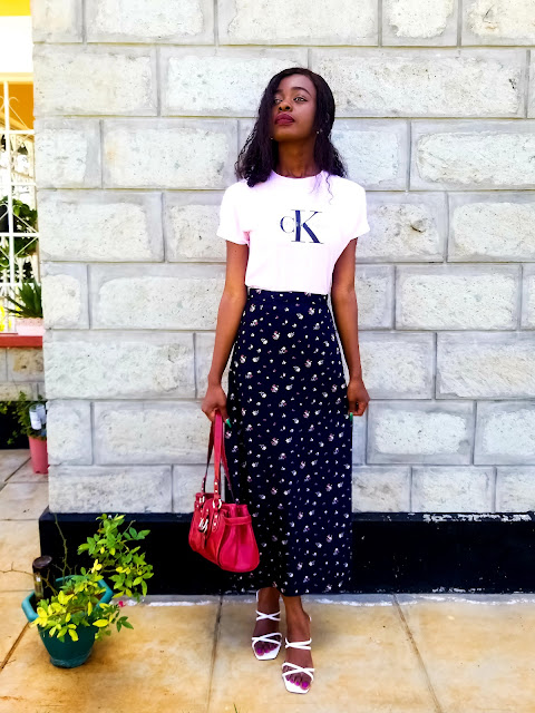 How To Wear A Midi Skirt With A Graphics T-Shirt