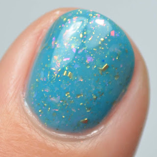teal nail polish with color shifting flakies