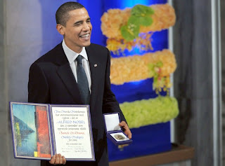 obama praises & wages war while accepting peace prize