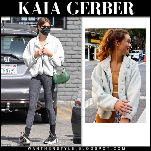 Kaia Gerber in white fleece jacket, grey leggings and black Nike sneakers