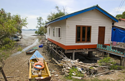 House and boats near Laem Hin