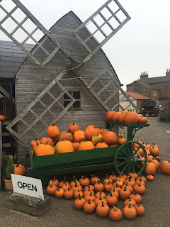 Hundreds of pumpkins at a country store in North Yorkshire, on a moody cloudy autumn day