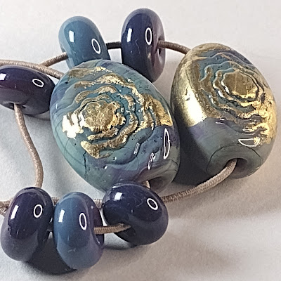 silver glass oval flower texture tab beads with gold leaf