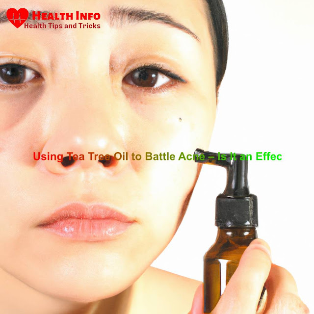 Woman with spotless skin applying tea tree oil to her face