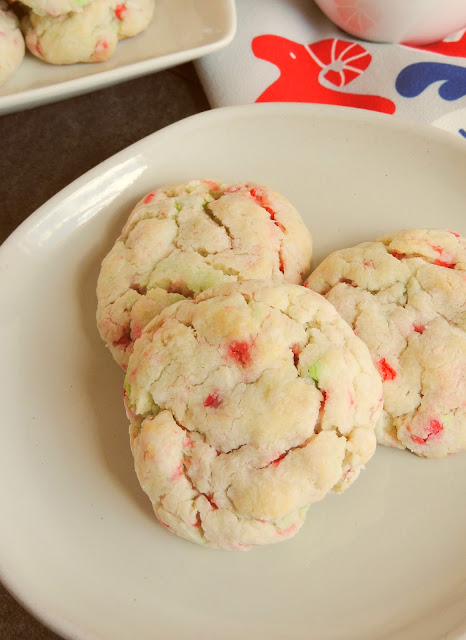 three cookies on a white plate.