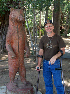 Jimmy checking wooden bear for Cindy