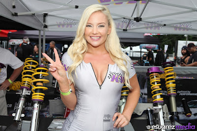 Big smile and lovely peace sign by Lisa Lee Marie, KW Suspensions umbrella girl at Formula Drift New Jersey 2015 event