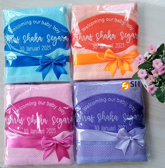 Souvenir Handuk Kelahiran Bayi Kemas Platik Pita