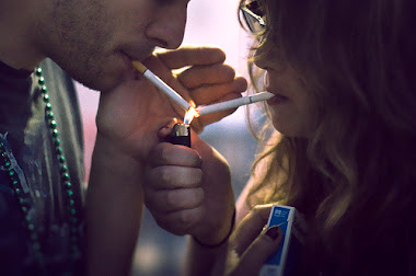 Vamos tú y yo a fumarnos el mundo.