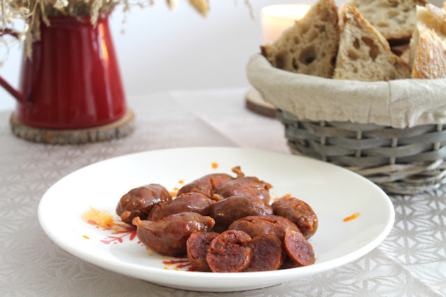 chorizos a la sidra en crock pot