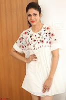 Lavanya Tripathi in Summer Style Spicy Short White Dress at her Interview  Exclusive 166.JPG