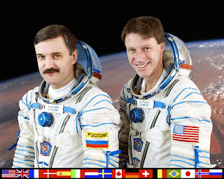 Expedition 8 Crew Featuring Mike Foale and Alexander Kaleri in Sokol Suits