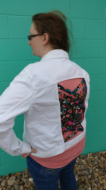 Upcycled jean jacket using fabric weaving