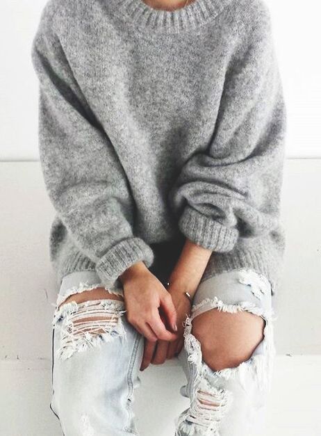 cashmere sweater and distressed jeans