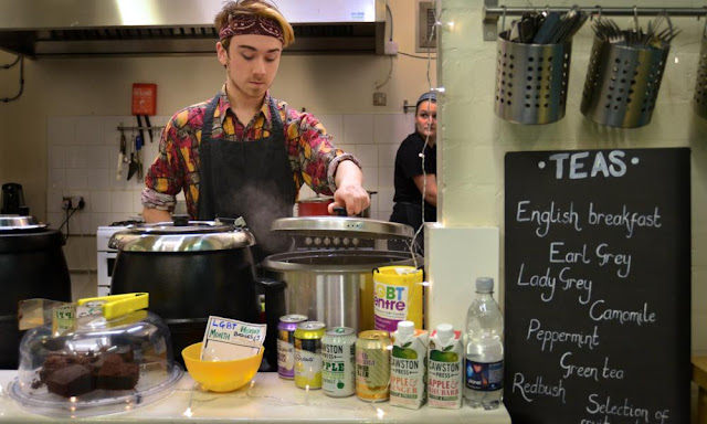 Volunteers serving curry at Sidney Street Cafe