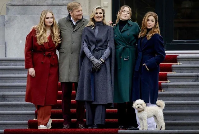 Queen Maxima is wearing a Hemmerle earrings. Princess Ariane wore a green coat by MaxMara. Princess Amalia wore a red coat