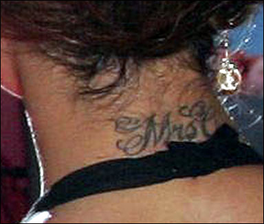 girls tattoos on back of neck. tattoos on neck for girls.