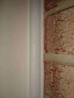 gap between wall and brick sealed