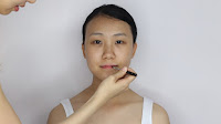 Modern Oriental Bridal Makeup - To keep her lip hydrate, apply Vaseline on the lip