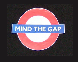 Famous London underground "mind the gap" phrase applied to the underground logo, and printed on a teeshirt