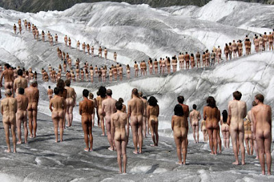 Hundreds posing naked at Swiss alps for a photo shoot