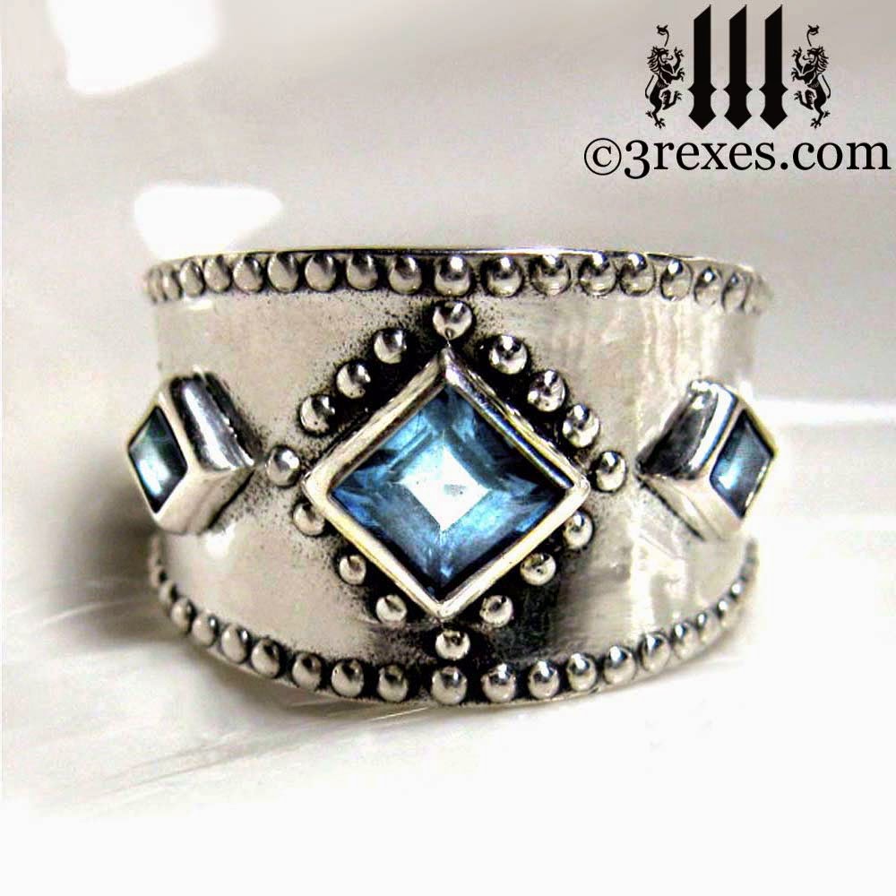 silver 3 wishes medieval wedding ring with blue topaz 