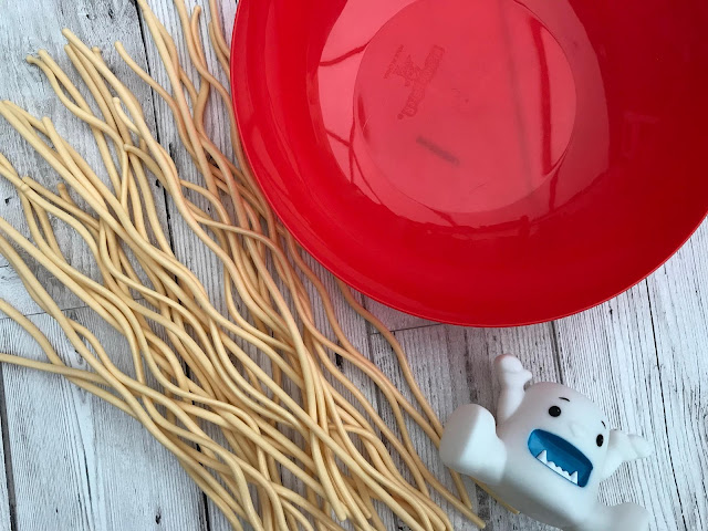 Unboxed Yeti in My Spaghetti - red bowl, plastic spaghetti and yeti