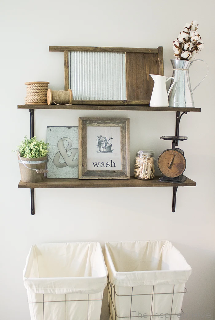 DIY rustic industrial laundry room shelving idea. Love those laundry hampers!