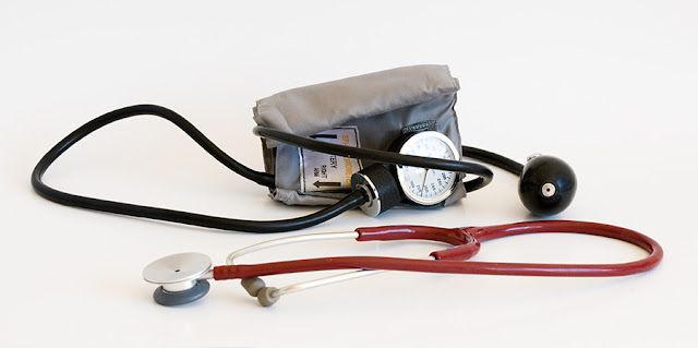 A blood pressure cuff and stethoscope.