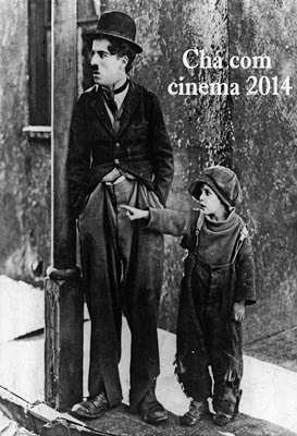 British actor Charlie Chaplin (1889 - 1977) and American actor Jackie Coogan (1914 - 1984) stand on a pavement by a lamp post in a still from the film 'The Kid', directed by Chaplin himself, 1921. (Photo by Chaplin- First National/Courtesy of Getty Images)